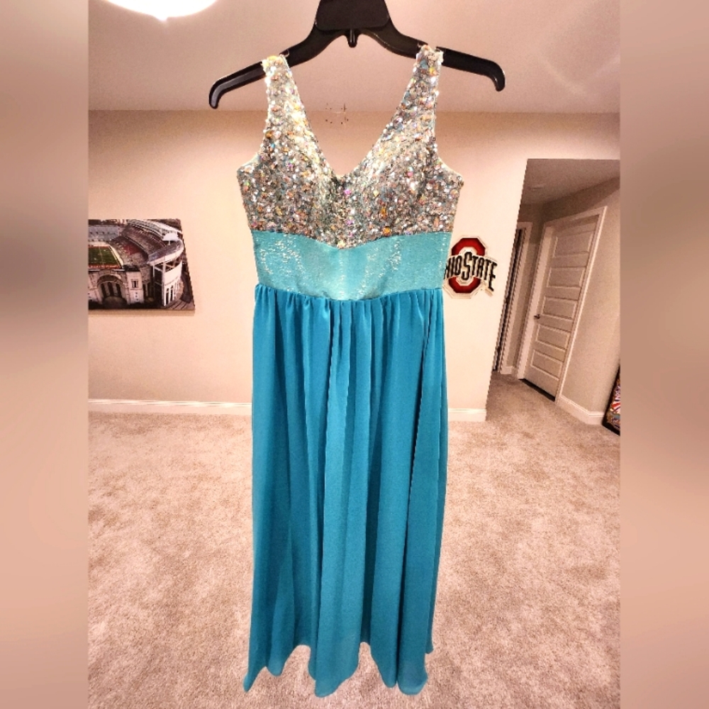 Beautiful custom made silver and  teal green sequin prom dress.